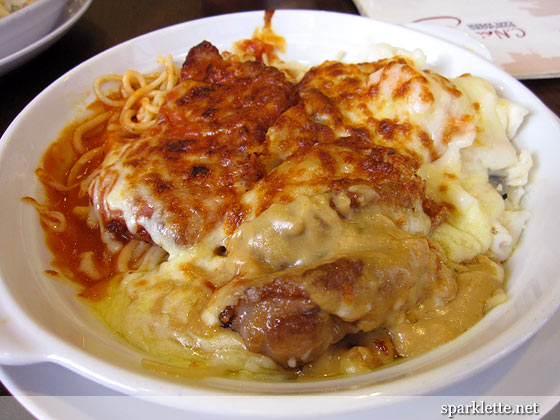 Macau baked spaghetti with pork chop, chicken chop and seafood