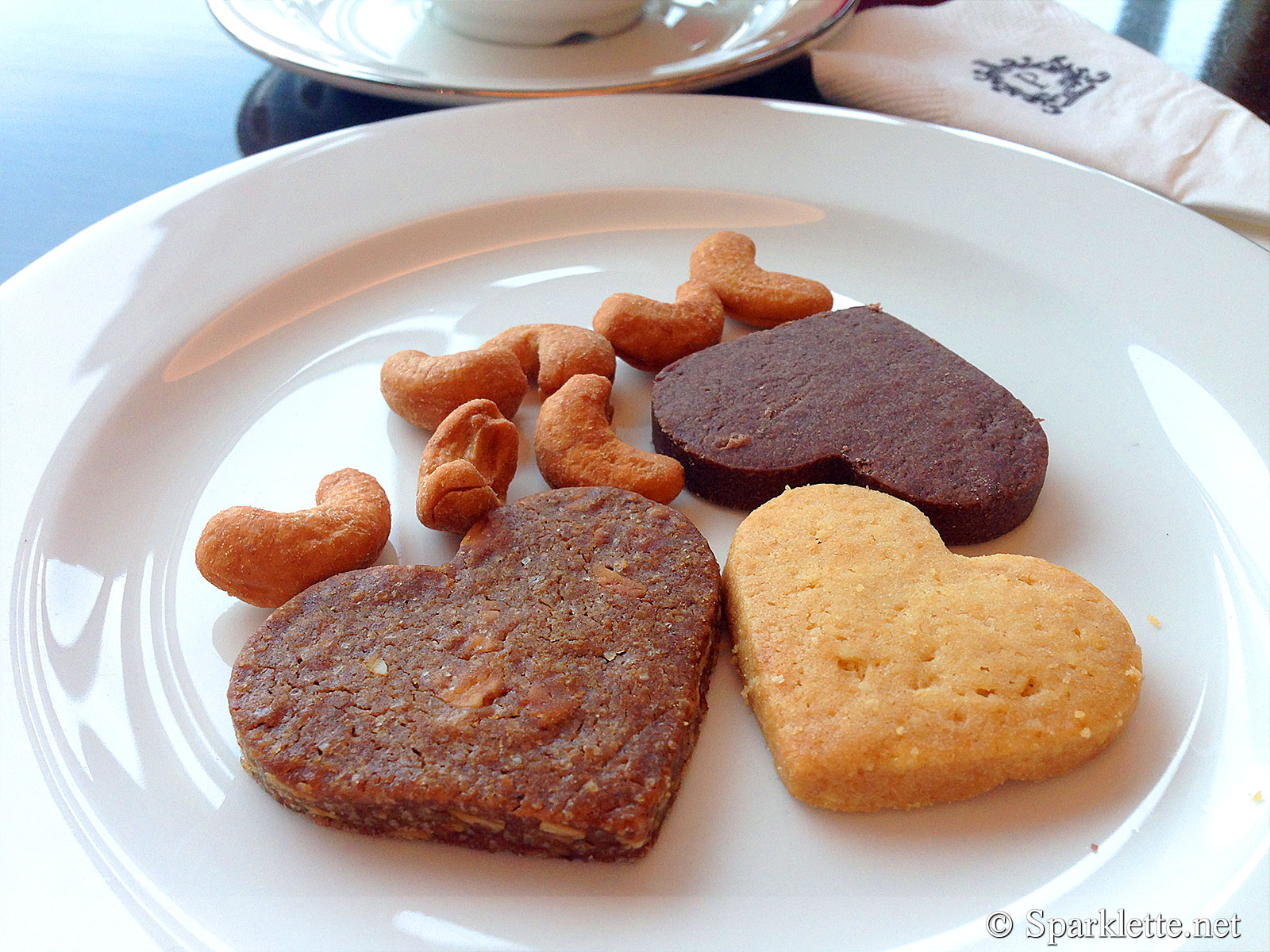 Heart-shaped cookies and cashew nuts