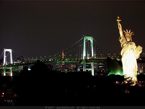 Statue of Liberty replica in Odaiba, Tokyo, overlooking the Rainbow Bridge