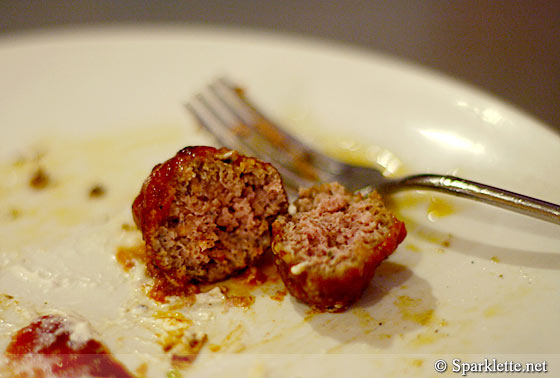 Savoury pork meatballs stewed in tomato sauce